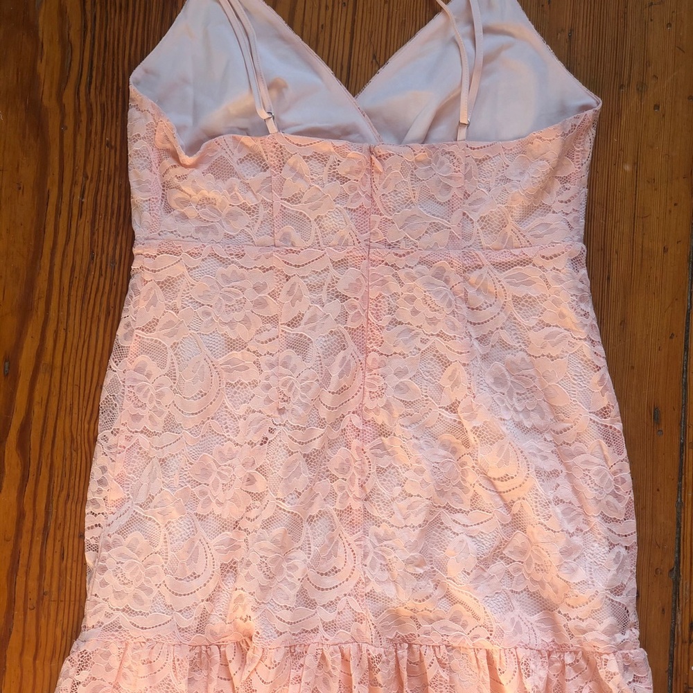 A baby pink laced dress